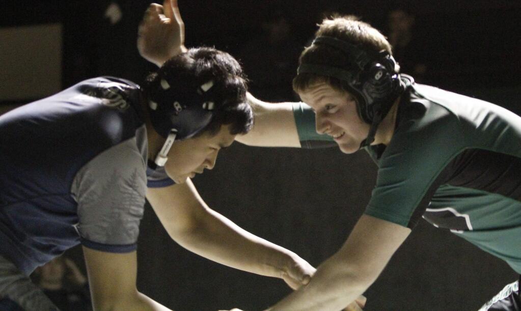 Bill Hoban/Index-TribuneSonoma's Dean Dunham, right, sizes up an opponent during a recent match. Dunham beat his Del Norte opponent Saturday in the NCS Duals.