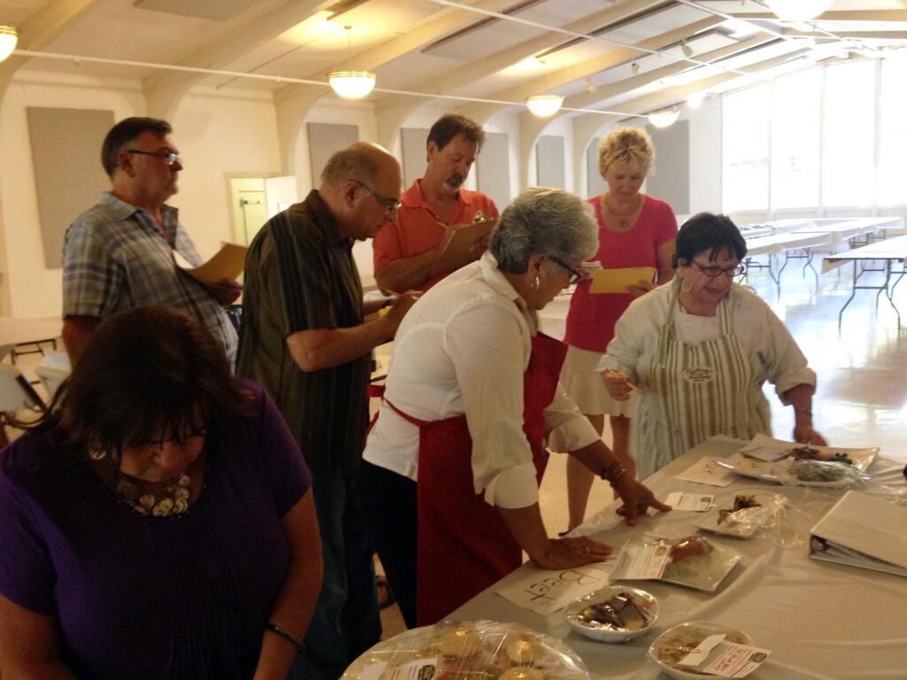 Judges decide the winners in the Harvest Fair Professional Food Competition. (DIANE PETERSON / PRESS DEMOCRAT)