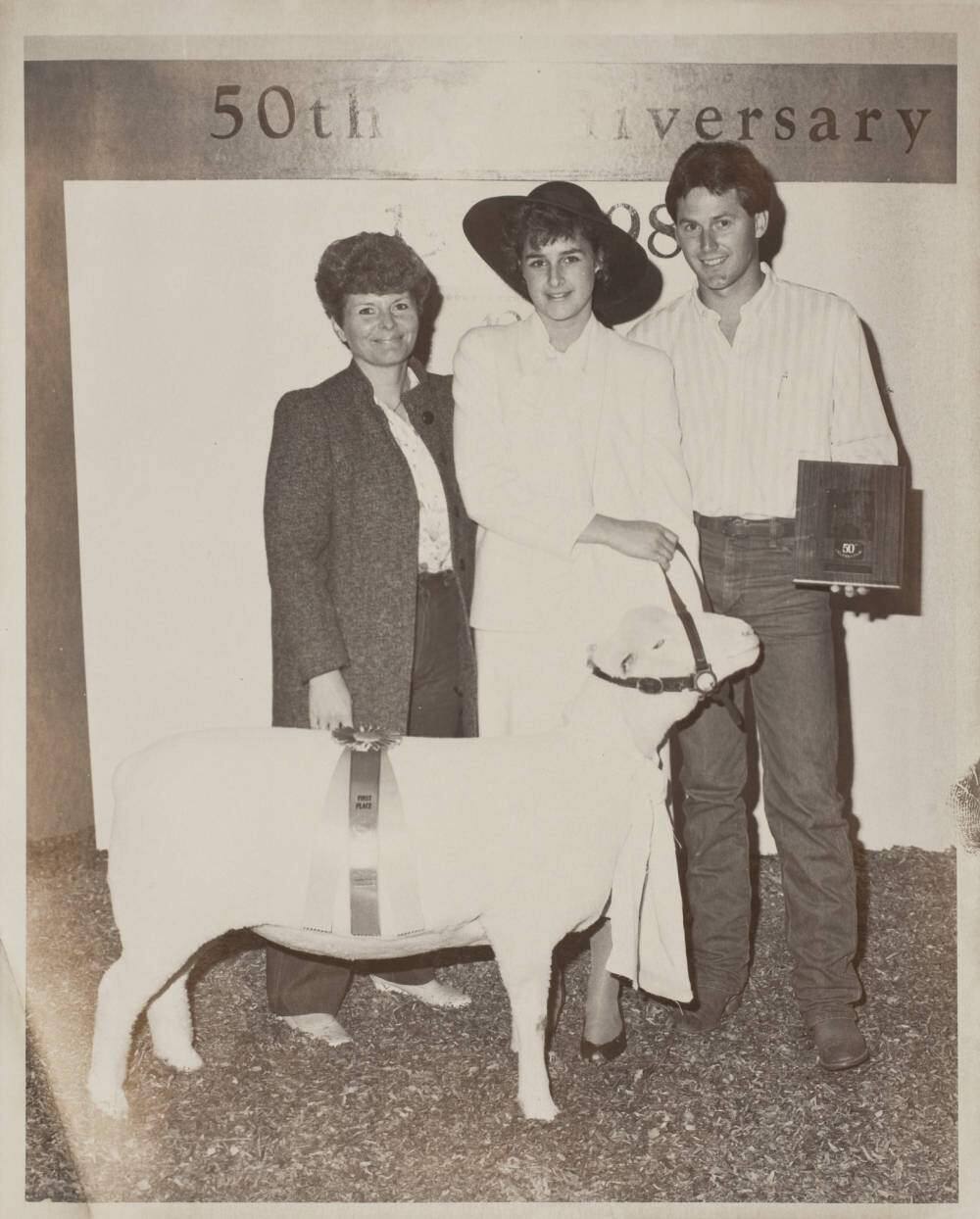 Two Rock residents Kathy Marzell, Susie Smith and Terry Lindley pose for a photo with their prize-winning sheep at the 1986 Sonoma County Fair. (SONOMA COUNTY LIBRARY)