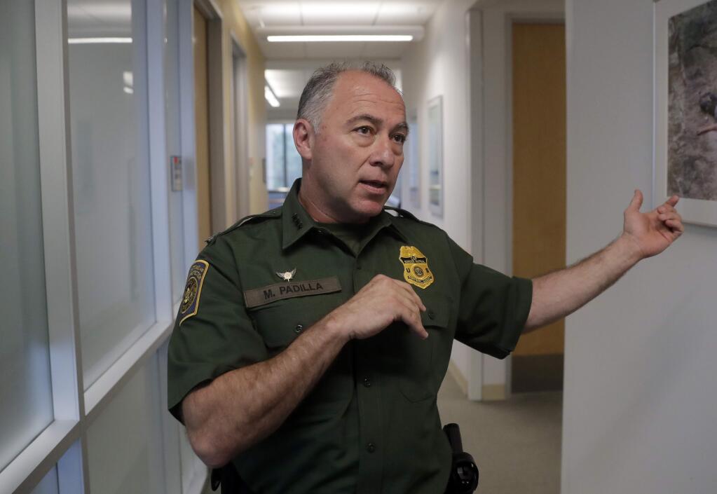 Rio Grande Valley Sector Chief Patrol Agent Manuel Padilla addresses immigration issues during in interview, Wednesday, June 20, 2018, in McAllen, Texas. In Texas' Rio Grande Valley, the busiest corridor for people trying to enter the U.S., Border Patrol officials say they must crack down on migrants and separate adults from children as a deterrent to others trying to get into the U.S. illegally. (AP Photo/Eric Gay)
