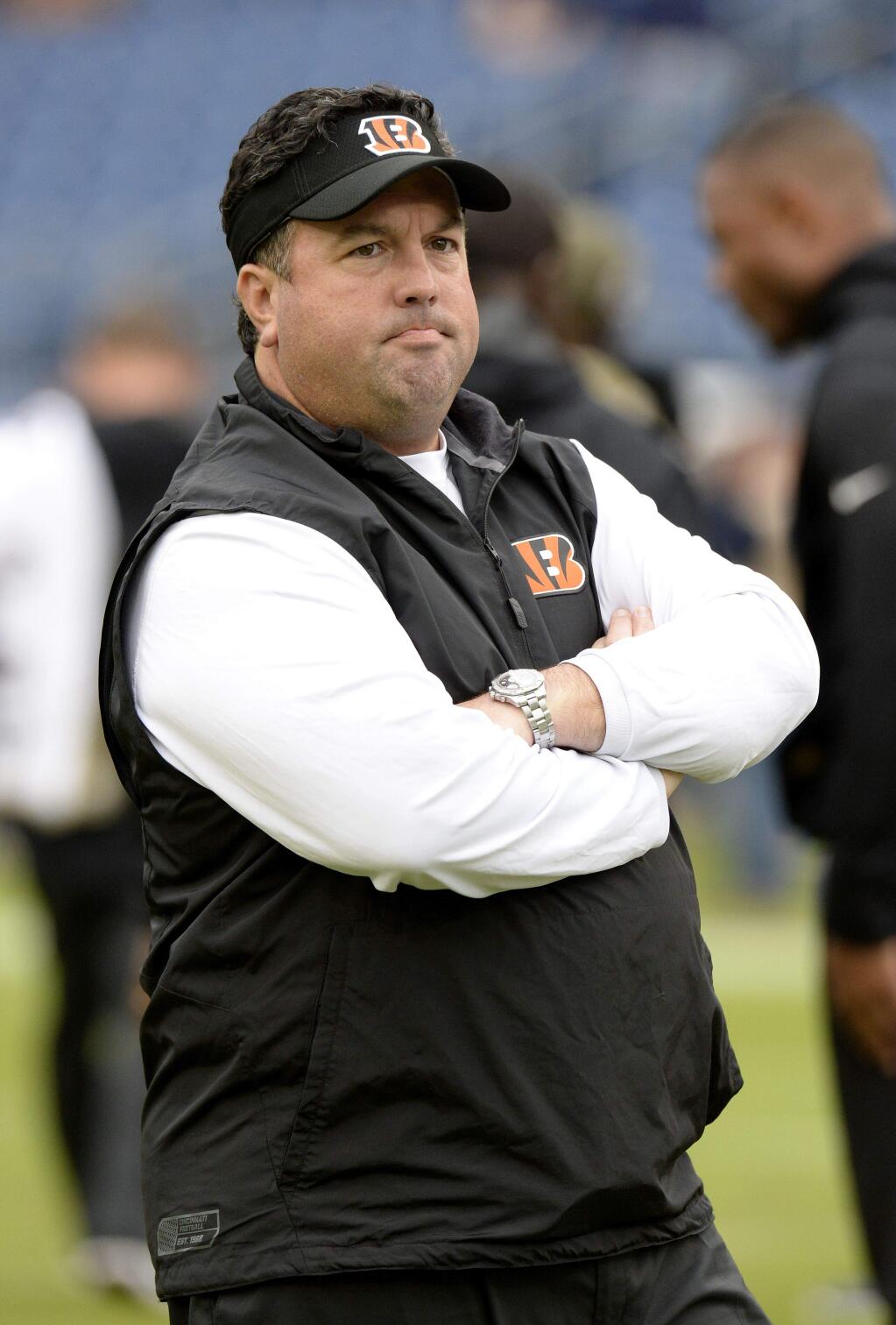 Cincinnati Bengals defensive coordinator Paul Guenther watches players warm up before a game between the Bengals and the Tennessee Titans Sunday, Nov. 12, 2017, in Nashville, Tenn. (AP Photo/Mark Zaleski)