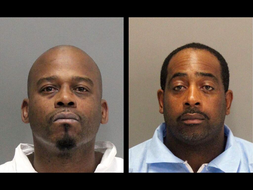 This undated photo released by the Santa Clara County Department of Corrections shows jail inmates John Bivins, left, and Tramel McClough. Authorities say Bivins and McClough escaped from a suburban Silicon Valley courthouse in a waiting vehicle on Monday, Nov. 6, 2017 while attending a hearing related to an armed robbery they are charged with. (Santa Clara County Department of Corrections via AP)