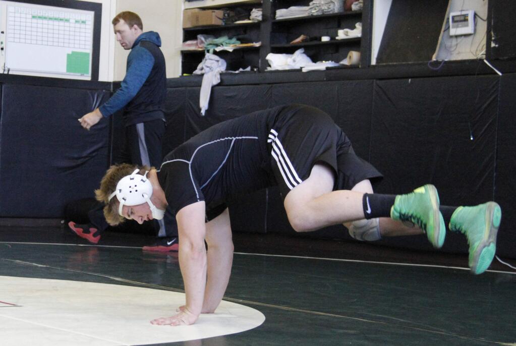 Bill Hoban/Index-TribuneTyler Winslow works out Tuesday in preparation for his trip to the state wrestling meet this weekend.