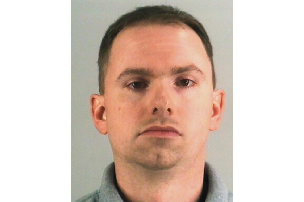 This undated photo provided by the Tarrant County Jail shows Aaron Dean. The Fort Worth police officer who shot and killed a black woman through a back window of her home while responding to a call about an open front door was charged with murder on Monday after resigning from the force. (Tarrant County Jail via AP)