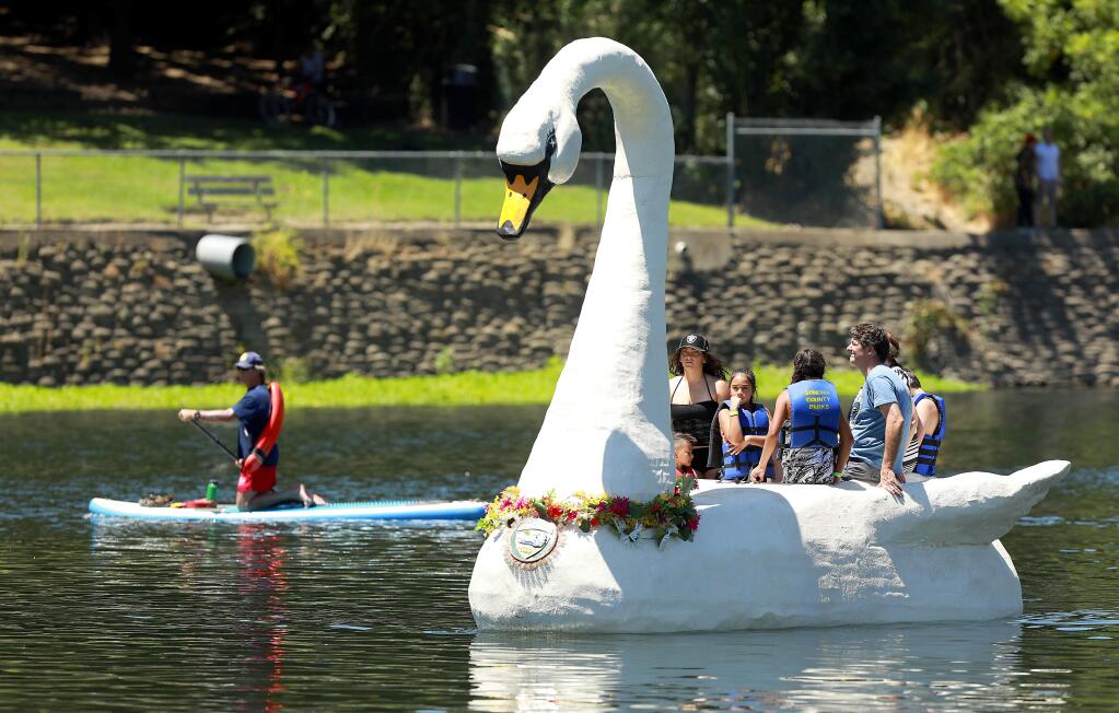 'Sandy the Swan' took to the waters of the Russian River at the Healdsburg Water Carnival at Veterans Memorial Beach. (John Burgess/The Press Democrat)