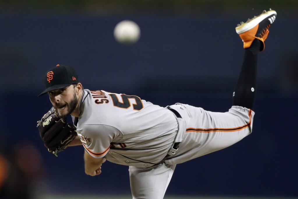 San Francisco Giants starting pitcher Andrew Suarez works against a San Diego Padres batter during the first inning of a baseball game Monday, Sept. 17, 2018, in San Diego. (AP Photo/Gregory Bull)