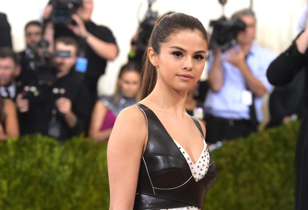 Selena Gomez arrives at The Metropolitan Museum of Art Costume Institute Benefit Gala, celebrating the opening of 'Manus x Machina: Fashion in an Age of Technology' on Monday, May 2, 2016, in New York. (Photo by Charles Sykes/Invision/AP)