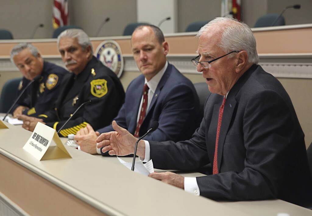 Rep. Mike Thompson, D-St. Helena, right, leads a discussion on gun violence during a hearing in Sacramento, Calif., Monday, Dec. 14, 2015. Thompson, chairman of the House Democrats' Gun Violence Prevention Task Force, and a panel including law enforcement, a Arizona gun show dealer, a California gun club owner, a former gang member and other gun control advocates discussed closing loopholes in federal background checks and providing more help for the mentally ill.(AP Photo/Rich Pedroncelli)