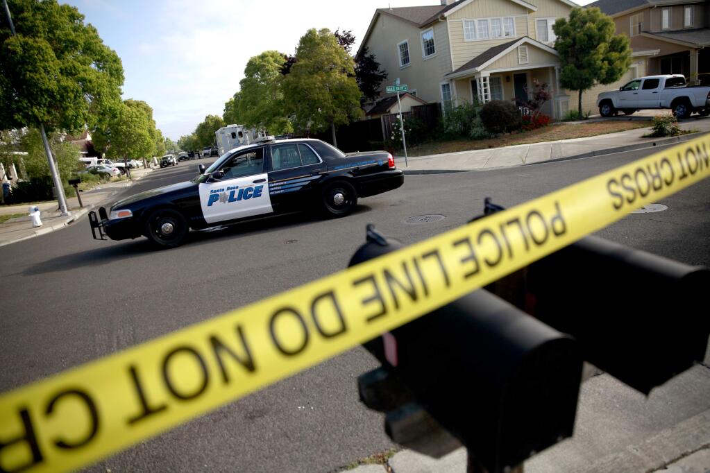Police secure the scene of a slaying on Red Tail Street in Santa Rosa on Monday, May 11, 2015. (BETH SCHLANKER/ PD FILE)