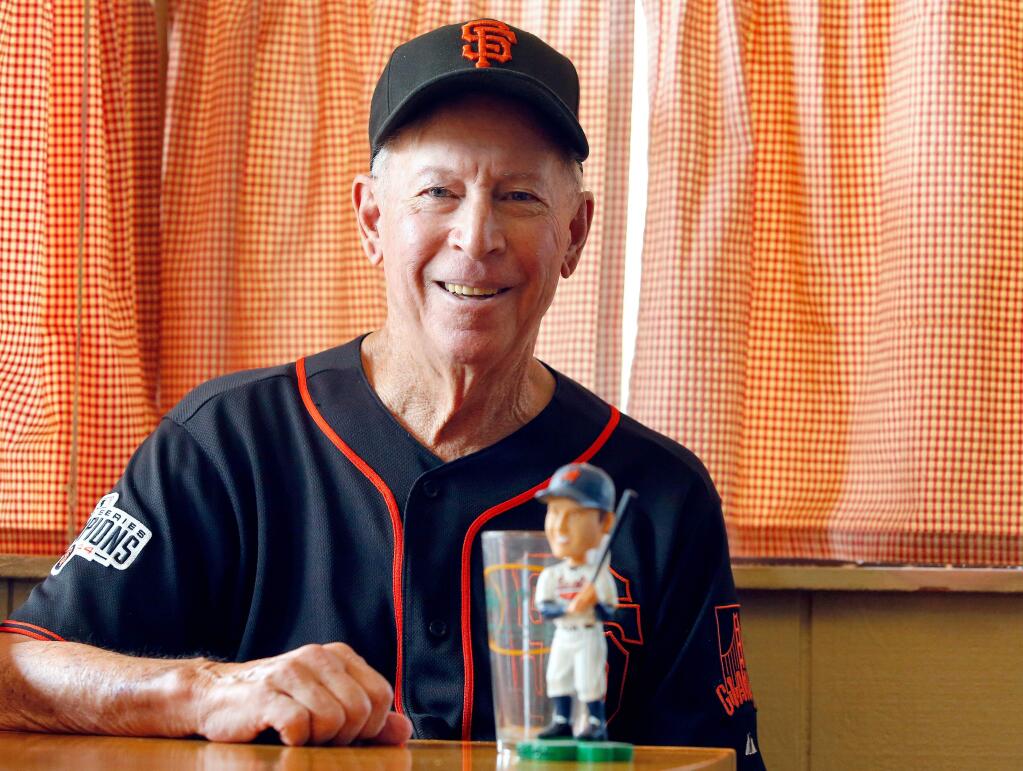 Tom O'Doul, cousin of Baseball Hall of Famer Francis 'Lefty' O'Doul, poses for a portrait with a bobble head of Lefty in Rohnert Park, California, on Sunday, September 3, 2017. (Alvin Jornada / The Press Democrat)