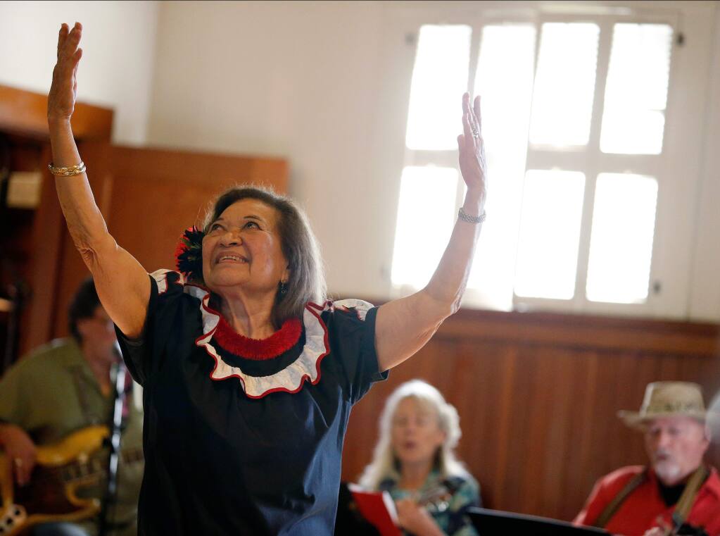 Betty Ann Ka'ihilani Bruno performs a hula dance during the monthly Kanikapila Hawaiian music jam session in 2017. The Sonoma Valley resident, who appeared as a Munchkin in the beloved 1939 film, “The Wizard of Oz,” died Sunday, July 30, 2023. She was 91. (Alvin Jornada / The Press Democrat)