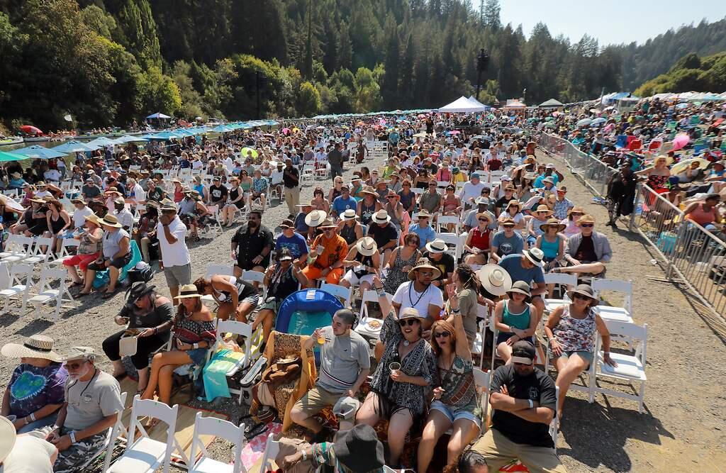 The crowd danced in the sand at Johnson's Beach in Guerneville at the Russian River Jazz & Blues Festival on Saturday. (John Burgess/The Press Democrat)