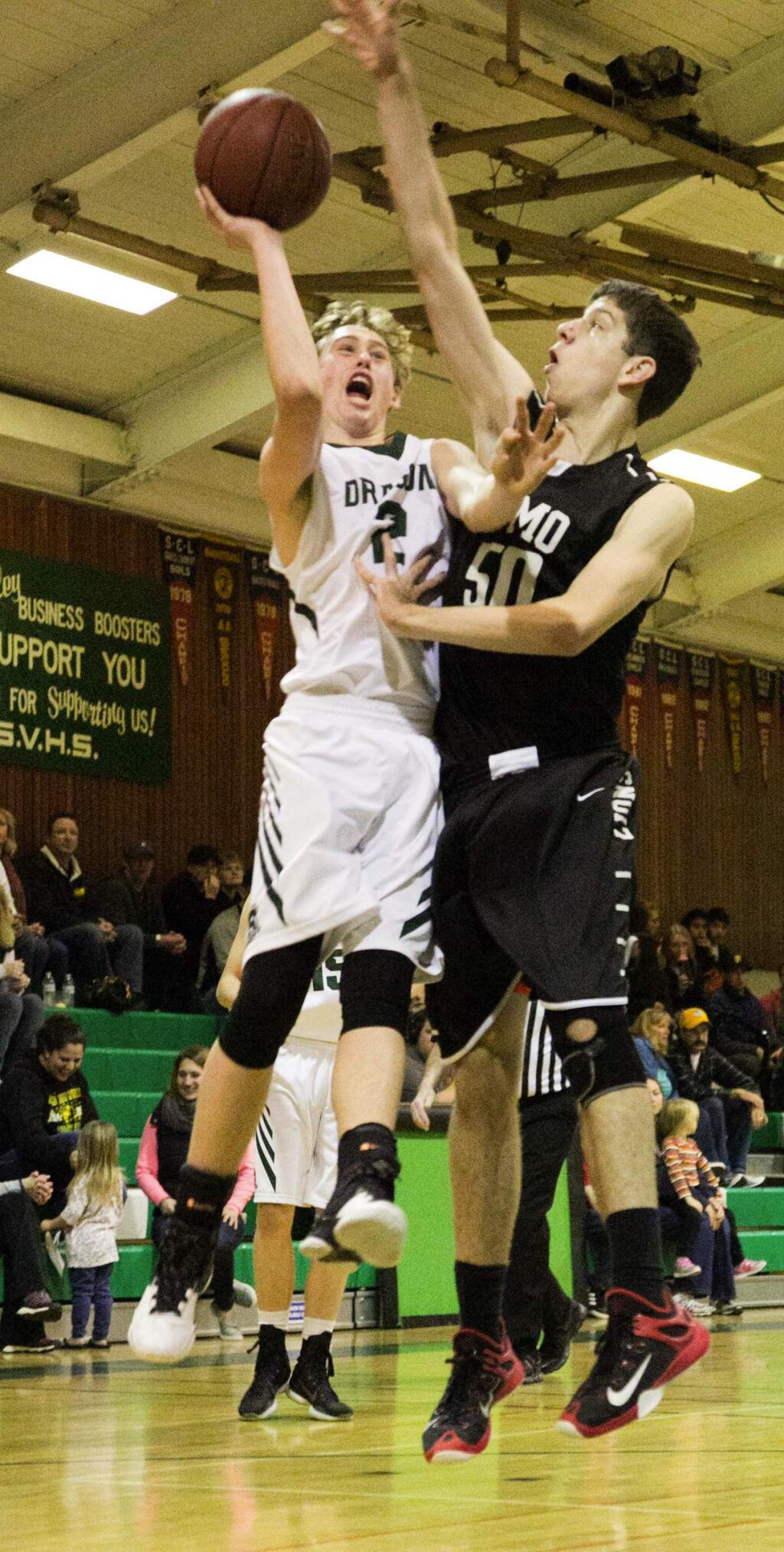 Julie Vader/Special to the Index-TribuneSonoma's Luke Severson goes up for a shot in Friday's game against El Molino. The Dragons won 43-26. Sonoma will host Healdsburg Wednesday in the Dragons home finale.