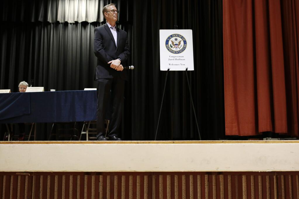 Congressman Jared Huffman listens to a question from the audience during the 'Save Our Healthcare' town hall at the Petaluma Veterans Building on Monday, March 6, 2017 in Petaluma, California. (RAMIN RAHIMIAN for The Press Democrat)
