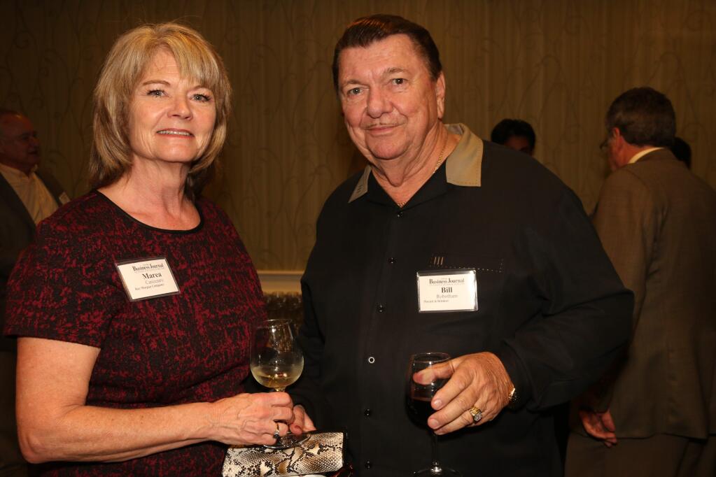 Marea Canizzaro of Ray Morgan Co. and Bill Robotham of Pisenti & Brinker at the VIP reception before North Bay Business Journal's 2016 Book of Lists release party at Doubletree Hotel in Rohnert Park on Jan. 19, 2016 (Jeff Quackenbush / North Bay Business Journal)