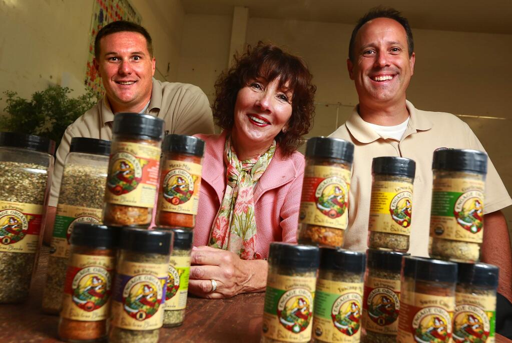 Co-founders Jason Sherwood, right, Pat Gage and Jeremy Fitzpatrick with some of the saltless spice blends produced by the Potter Valley company. (JOHN BURGESS/ PD)