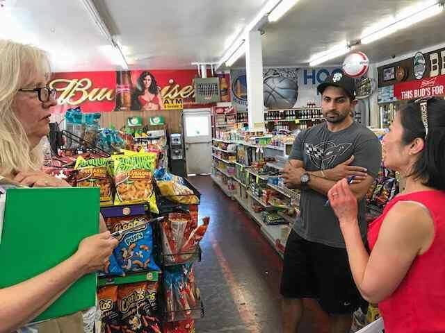 Francie Macmillan, left, of Vallejo Together and Sahra Pak of VibeSolano discuss the 'healthy store makeover' process with Ravi Sandhu, owner of B&J Food & Liquor, set to become B&J Market on May 19, 2017. (FACEBOOK / VALLEJOTOGETHER)