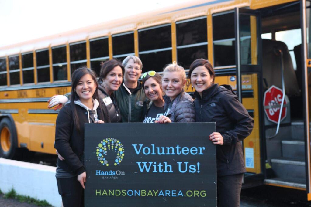Principal Kathleen Hawing (center) with some Hands On volunteers on Jan. 31.