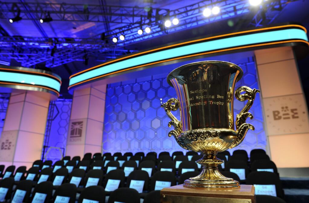 The championship trophy awaits a winner of the 2015 Scripps National Spelling Bee, as the Bee begins in Oxon Hill, Md., Wednesday, May 27, 2015. (AP Photo/Cliff Owen)