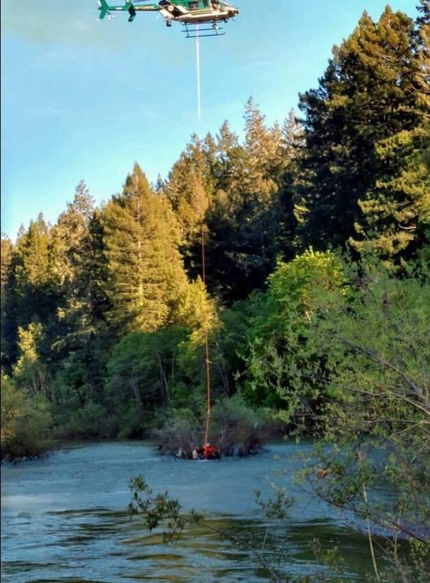 A family of four plus a person who tried to rescue them were plucked from the Russian River by the Sonoma County sheriff's helicopter on Tuesday, April 23, 2019. (SONOMA COUNTY SHERIFF'S OFFICE/ FACEBOOK)