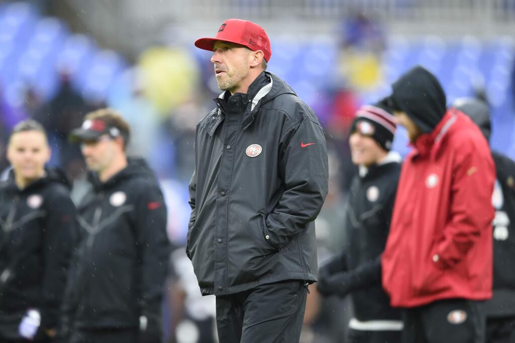 San Francisco 49ers head coach Kyle Shanahan walks on the field before the start of agame against the Baltimore Ravens, Sunday, Dec. 1, 2019, in Baltimore, Md. (AP Photo/Gail Burton)