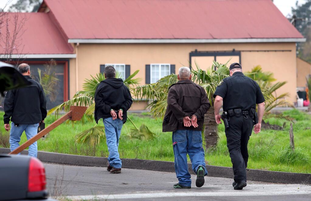 Law enforcement conduct an investigation into a reported kidnap and rape at a property on Stony Point Road in Santa Rosa on Thursday, Feb. 19, 2015. (CHRISTOPHER CHUNG/ PD)