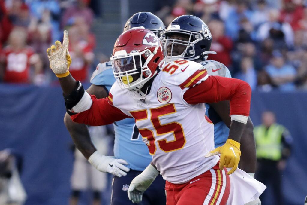 Kansas City Chiefs defensive end Frank Clark celebrates after a play against the Tennessee Titans in the second half Sunday, Nov. 10, 2019, in Nashville, Tenn. (AP Photo/James Kenney)