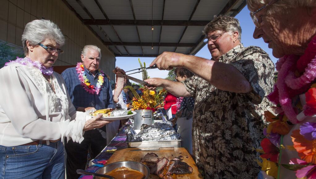 The Rotary Club of Sonoma Valley hosted a luau Saturday to benefit the local Moose Lodge. The money raised from the benefit will go toward the purchase of a new HVAC system for the lodge. (Photos by Robbi Pengelly/Index-Tribune)