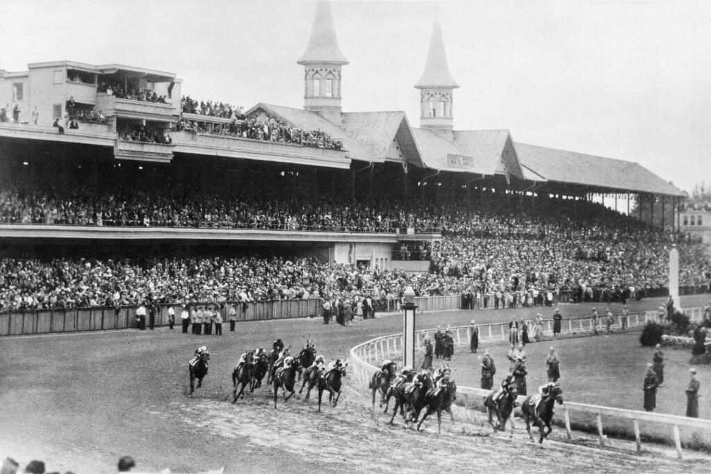 FILE - In this June 9, 1945, file photo, Hoop Jr. leads by a length during the 71st running of the Kentucky Derby horse race at Churchill Downs in Louisville, Ky. This year is the first time the Derby won't be held on the first Saturday in May since 1945, when it was run June 9. Churchill Downs postponed the opening leg of the Triple Crown from May 2 to Sept. 5, due to concern over the coronavirus pandemic that has wreaked havoc with the world's sports calendar. (AP Photo/File)
