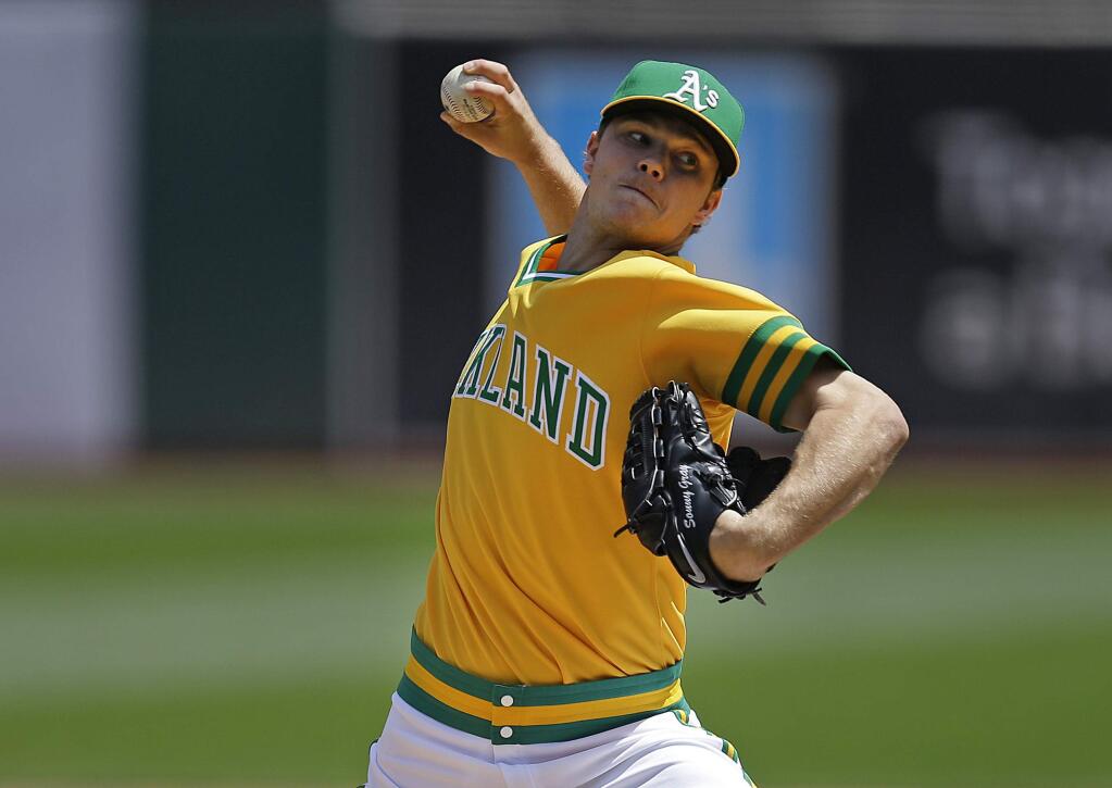 FILE - In this Aug. 6, 2016, file photo, Oakland Athletics pitcher Sonny Gray works against the Chicago Cubs in the first inning of a baseball game in Oakland, Calif. Gray is starting fresh, ready to be Oakland‚Äôs reliable ace again. (AP Photo/Ben Margot, File)