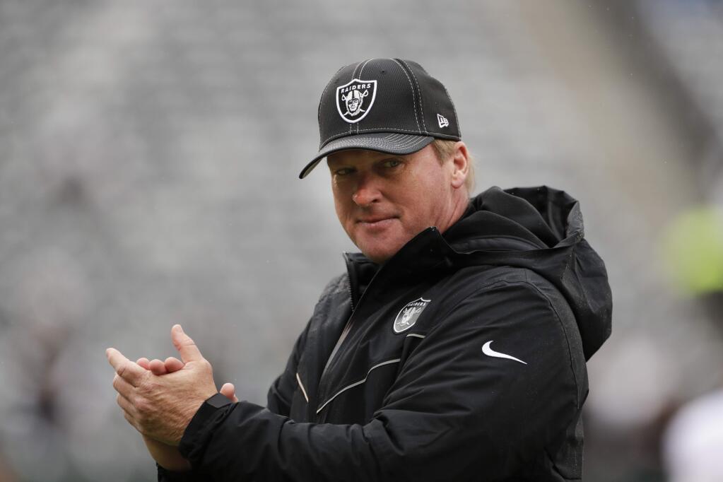 Oakland Raiders head coach Jon Gruden watches his team warm up before a game against the New York Jets Sunday, Nov. 24, 2019, in East Rutherford, N.J. (AP Photo/Adam Hunger)