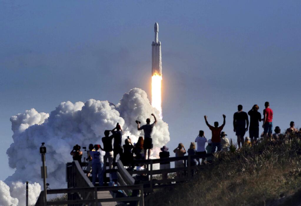 The SpaceX Falcon 9 rocket lifts off Tuesday from Kennedy Space Center in Florida. (JOE BURBANK / Orlando Sentinel)