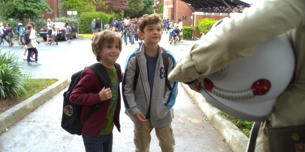 This image released by Lionsgate shows Jacob Tremblay, left, and Noah Jupe in a scene from 'Wonder.' (Dale Robinette/Lionsgate via AP)