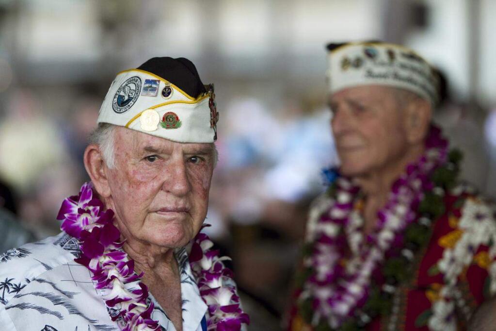 Pearl Harbor survivor Earl Smith is seen at the memorial ceremony, Wednesday, Dec. 7, 2011, in Pearl Harbor, Hawaii. (Marco Garcia/ Associated Press)