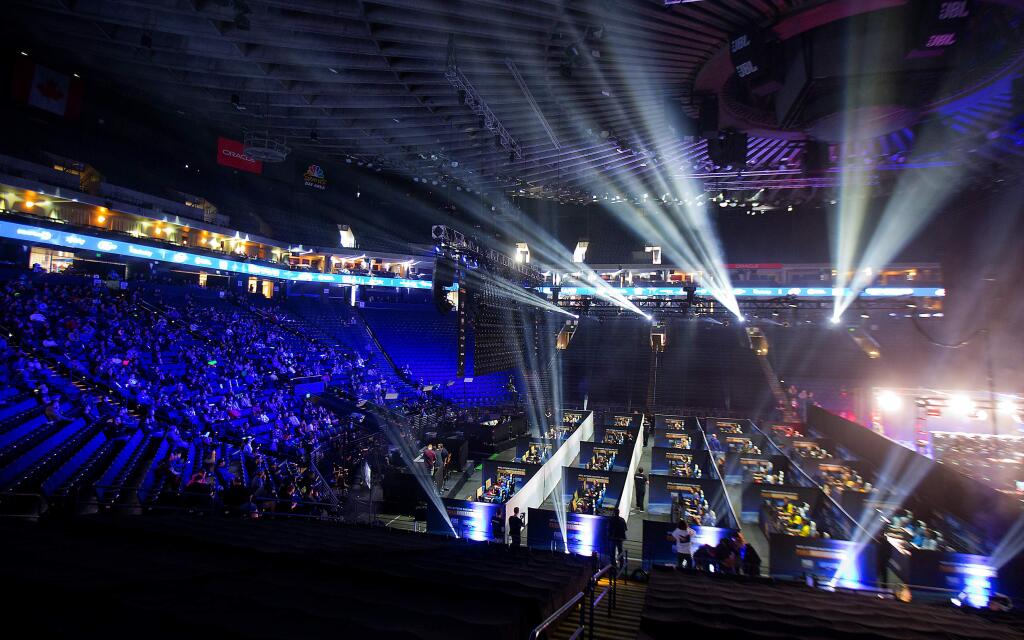Video game teams battled in Counter-Strike: Global Offensive while thousands of spectators viewed the action on giant screens at the Intel Extreme Masters tour event at the Oracle Arena in Oakland on Saturday, November 18, 2017. (photo by John Burgess/The Press Democrat)