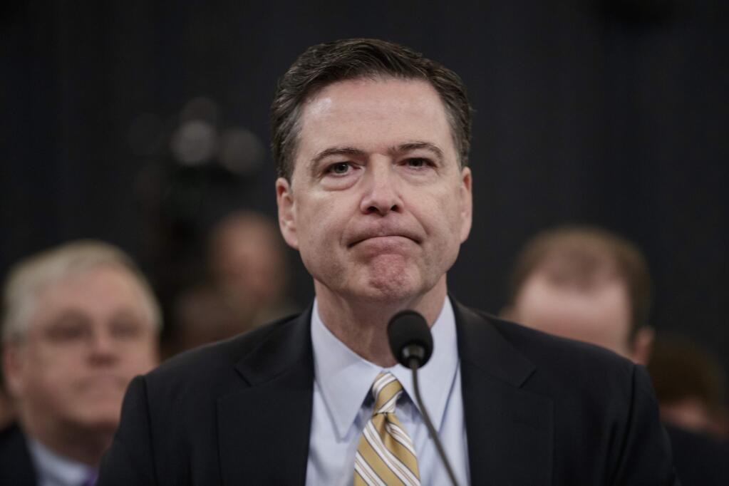 In this March 20, 2017 photo, FBI Director James Comey pauses as he testifies on Capitol Hill in Washington, before the House Intelligence Committee hearing on allegations of Russian interference in the 2016 U.S. presidential election. Comey's appearance Thursday before the Senate intelligence committee is one of the most anticipated congressional hearings in years. (AP Photo/J. Scott Applewhite)