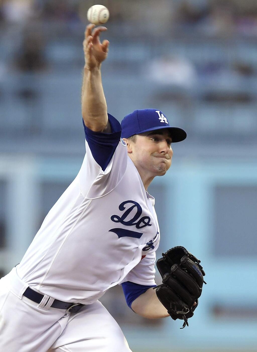 Los Angeles Dodgers pitcher Ross Stripling throws during the first inning of the team's baseball game against the San Francisco Giants on Friday, June 15, 2018, in Los Angeles. (AP Photo/Mark J. Terrill)