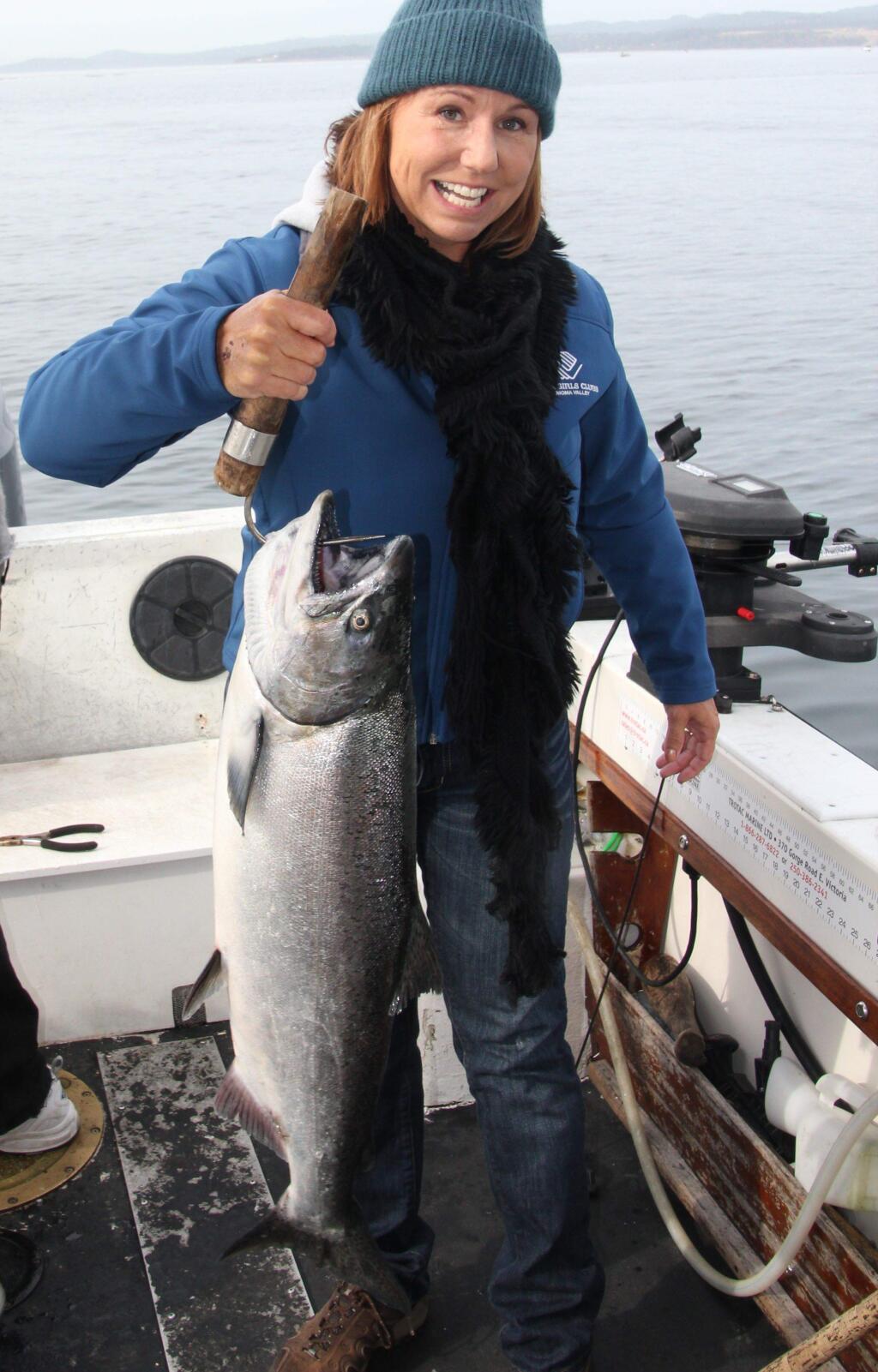 Submitted photo ERIN DOWNING finally sent me proof that she really did out-fish her husband Dale last month in the straights between Vancouver Island and mainland British Columbia.  She looks like a veteran fisherwoman holding this monster king salmon, one of several she caught up there.