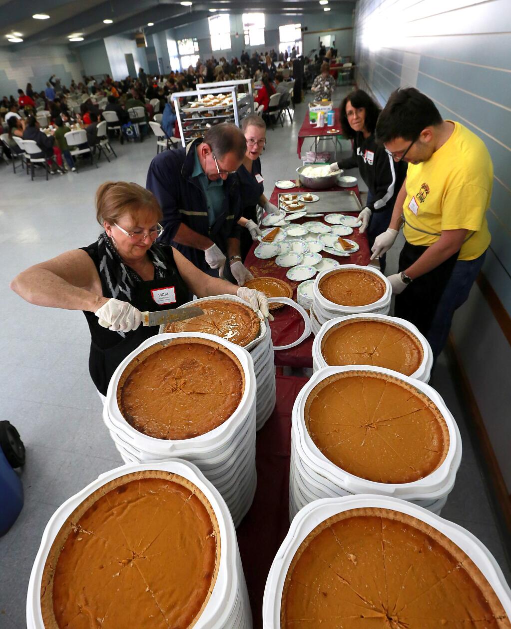 Thousands of people in need received free coats, haircuts, medical checkups and a Thanksgiving meal during the Great Thanksgiving Banquet at the Sonoma County Fairgrounds on Wednesday, November 26, 2014. (Photo by John Burgess/The Press Democrat)