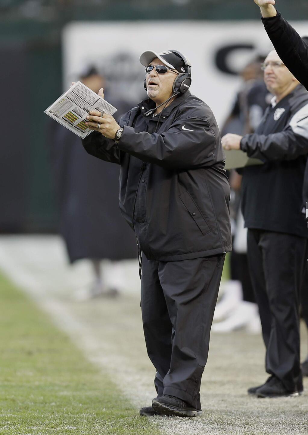 Oakland Raiders interim head coach Tony Sparano yells from the sideline during the second half of an NFL football game against the San Francisco 49ers in Oakland, Calif., Sunday, Dec. 7, 2014. The Raiders won 24-13. (AP Photo/Ben Margot)