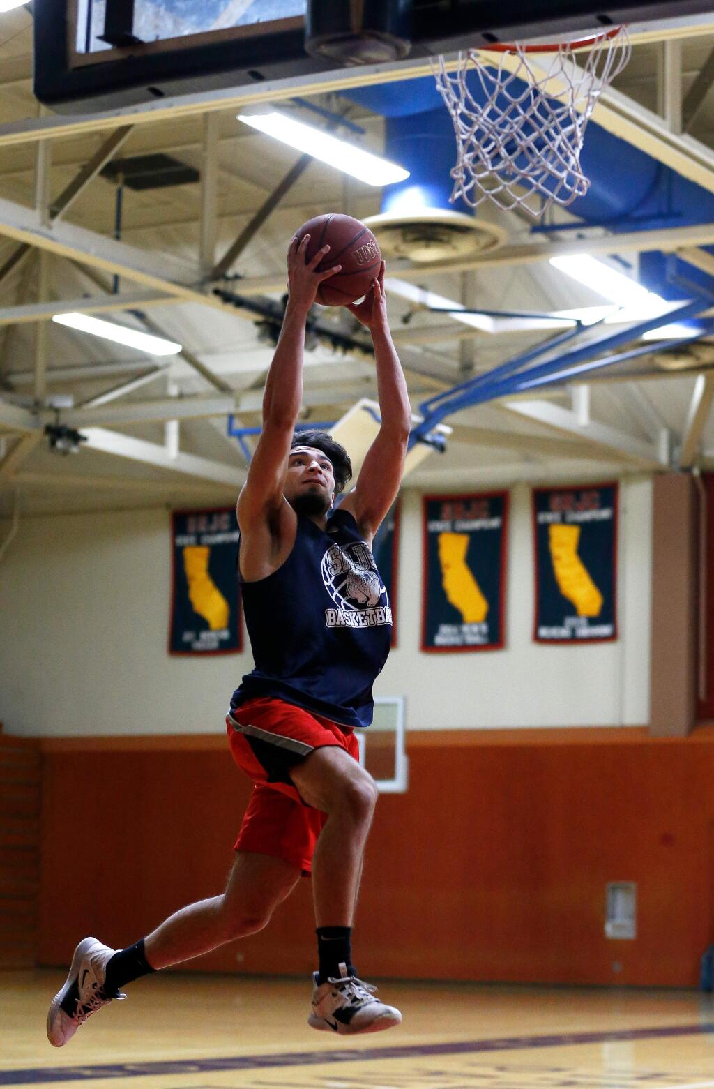SRJC Bear Cubs guard and Big 8 player of the year Atmar Mundu goes for a lay-in during practice at Haehl Pavilion in Santa Rosa on Tuesday, March 10, 2020. (Alvin Jornada / The Press Democrat)