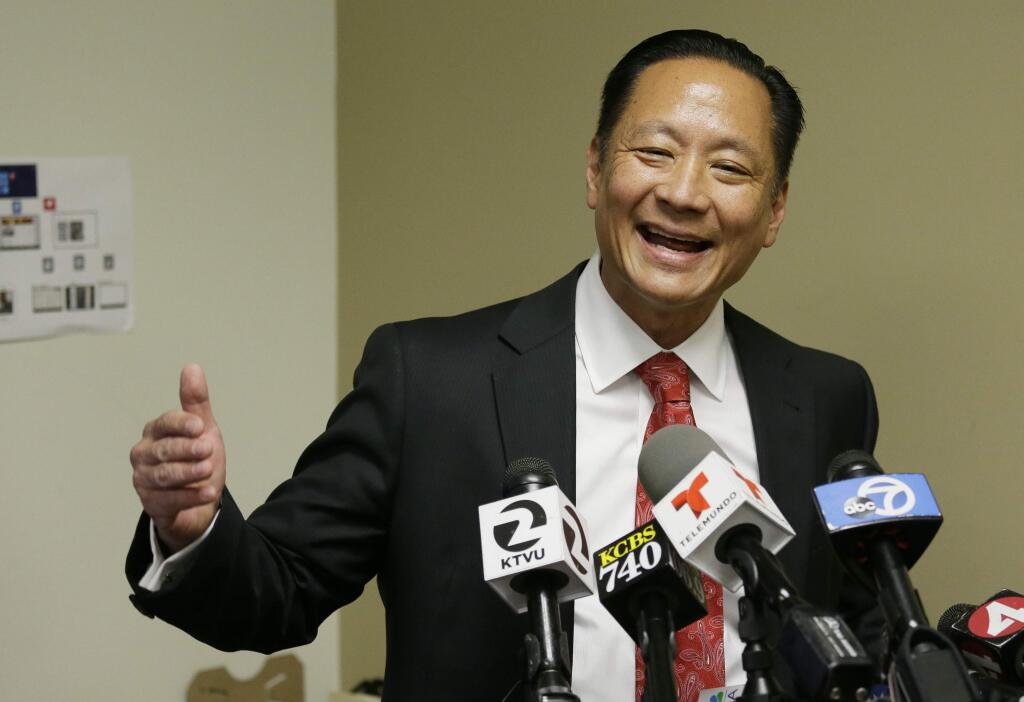 San Francisco Public Defender Jeff Adachi gestures during a news conference Tuesday, April 26, 2016, in San Francisco. Adachi released text messages Tuesday he says were written by a former officer disparaging blacks, Latinos and others. The text messages, which were exchanged with other officers at the time, also make derogatory references to President Barack Obama and NBA superstar LeBron James. The text messages were found on Jason Lai's personal cellphone. Lai resigned from the department earlier this month. (AP Photo/Eric Risberg)