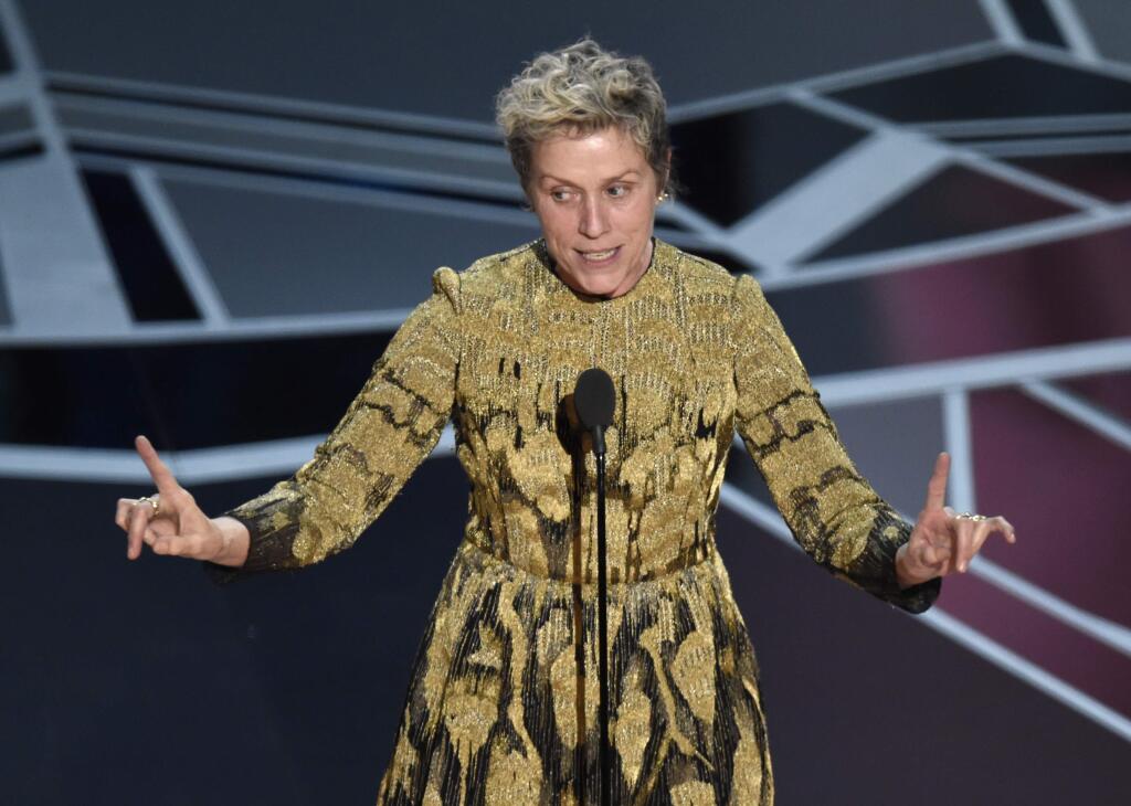 Frances McDormand accepts the award for best performance by an actress in a leading role for 'Three Billboards Outside Ebbing, Missouri' at the Oscars on Sunday, March 4, 2018, at the Dolby Theatre in Los Angeles. (Photo by Chris Pizzello/Invision/AP)
