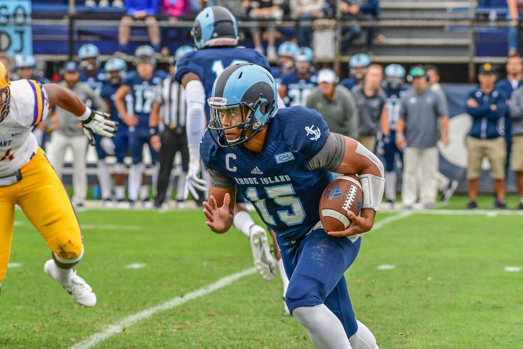 In his first three games for the University of Rhode Island in 2018, Lawson passed for 839 yards and nine touchdowns. He was injured against Harvard in the next game. (MICHAEL SCOTT / URI ATHLETICS)