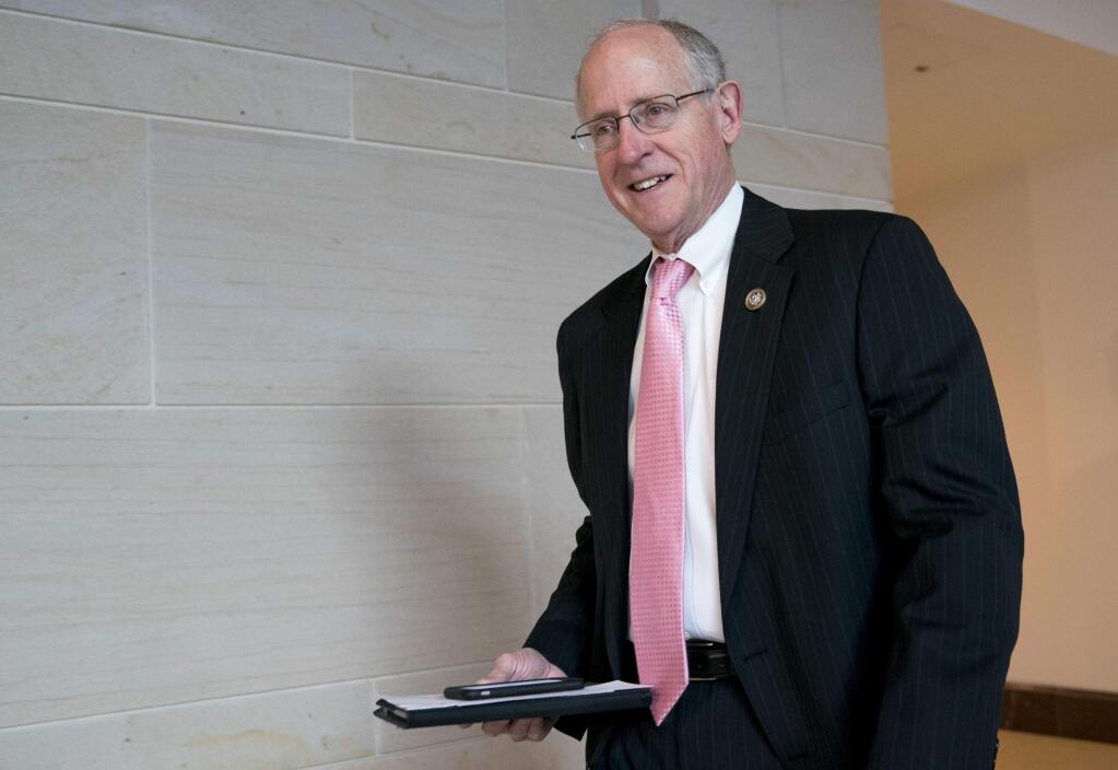In this March 8, 2018, photo, Rep. Mike Conaway, R-Texas, left, at the Capitol in Washington. Republicans on the House intelligence committee have completed a draft report concluding there was no collusion or coordination between Donald Trump's presidential campaign and Russia. The finding is sure to please the White House and enrage panel Democrats who have not yet seen the document. After a yearlong investigation, Conaway says the committee has finished doing witness interviews. (AP Photo/Andrew Harnik)