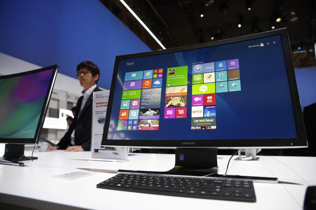 The ATIV One 7 Curved computer is on display at the Samsung booth during the International CES, Tuesday, Jan. 6, 2015, in Las Vegas. (AP Photo/John Locher)