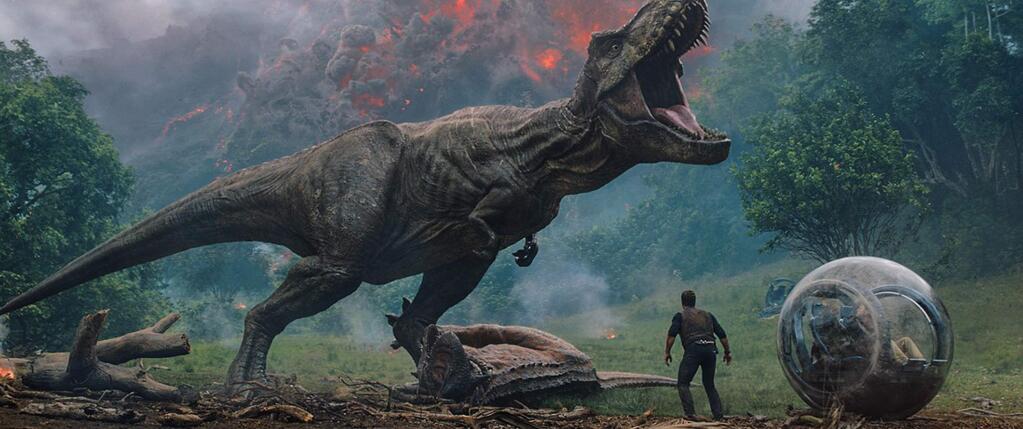 Three years after theme park and luxury resort Jurassic World was destroyed by dinosaurs, Isla Nublar now sits abandoned by humans while the surviving dinosaurs fend for themselves in the jungles. When the island's dormant volcano begins roaring to life, Owen (Chris Pratt) and Claire (Bryce Dallas Howard) mount a campaign to rescue the remaining dinosaurs from this extinction-level event. (Universal Pictures)