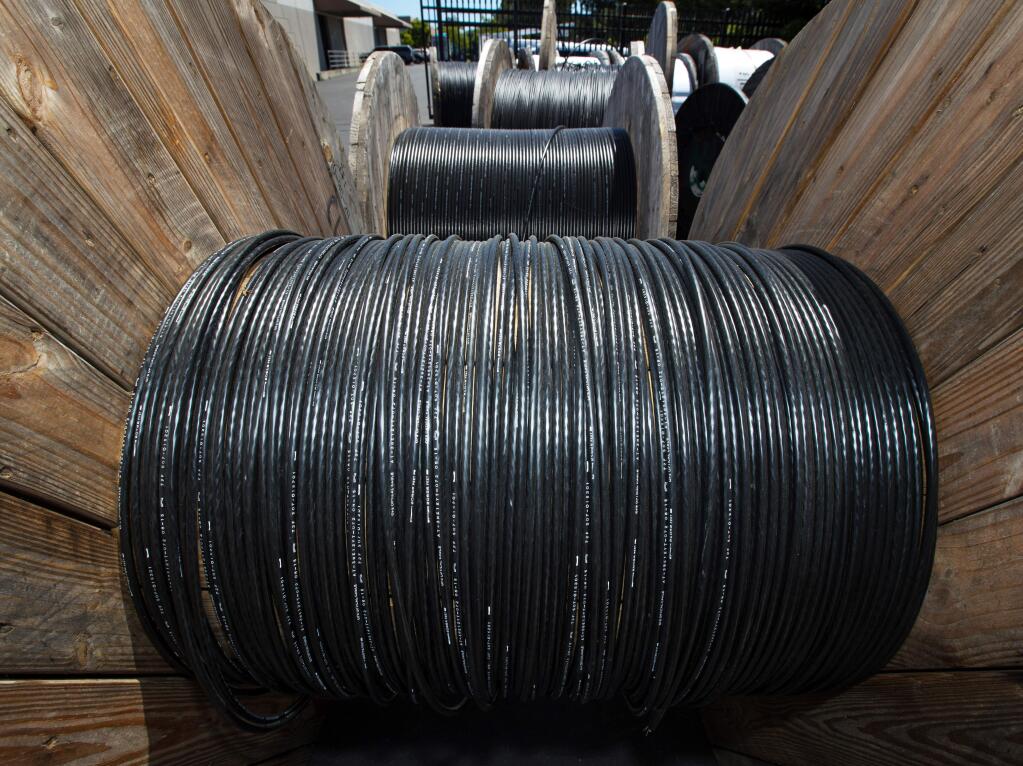 Fiber optic cable is held on giant spools ready for transport at Sonic headquarters In Santa Rosa, Calif., on Friday, June 2, 2017. (Photo by Darryl Bush / For The Press Democrat)