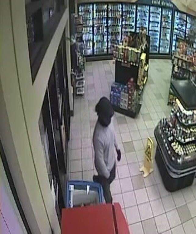 Still photo of the robber taken from security footage.