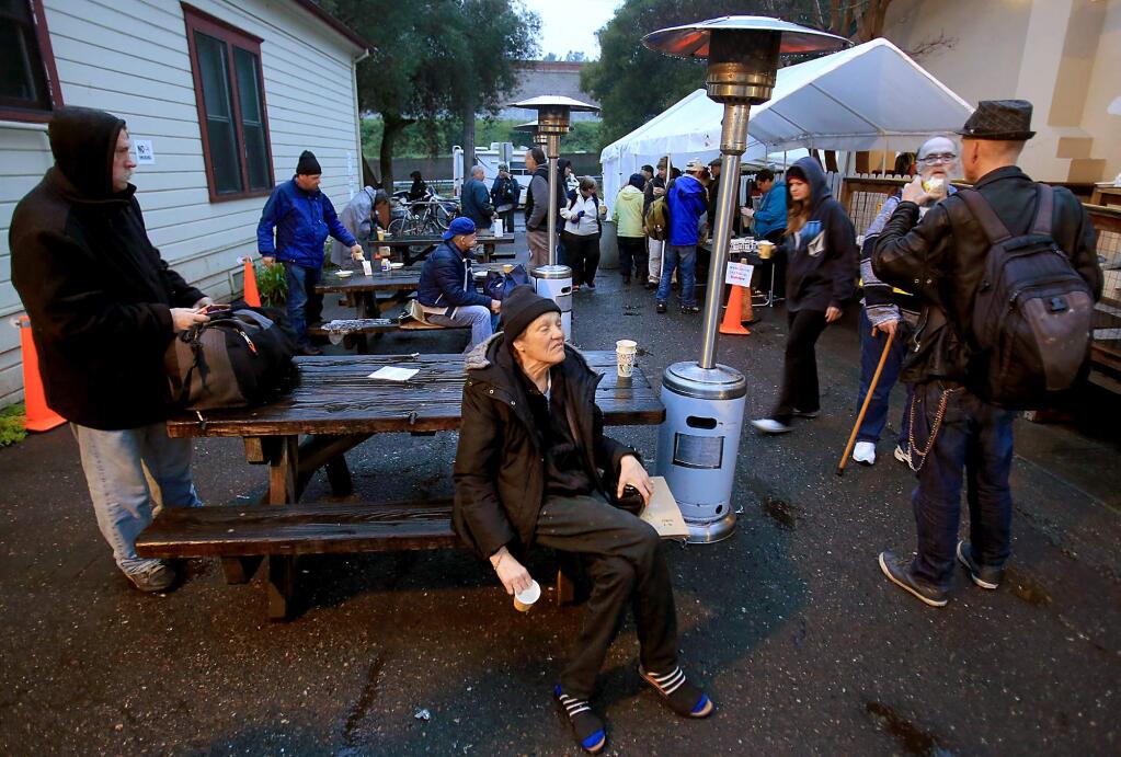 Homeless men and women gather at Catholic Charities Homeless Service Center in Santa Rosa during the 2016 homeless census. (KENT PORTER / Press Democrat)